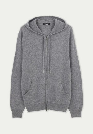 Sweat à capuche gris avec fermeture éclair, poches avant, capuche avec cordon de serrage, poignets et ourlet côtelés, fabriqué en tissu tricoté doux.