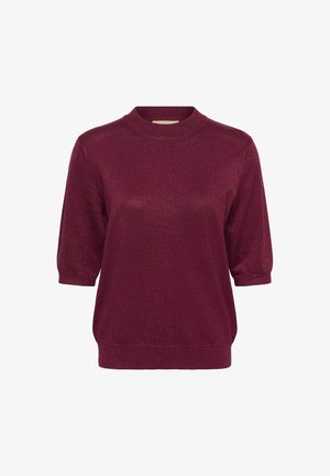 Burgundia lõngasärk, millel on ümmargune kaelus, lühikesed varrukad ja tekstureeritud pind. Sile kangas kerge sädeleva efektiga.