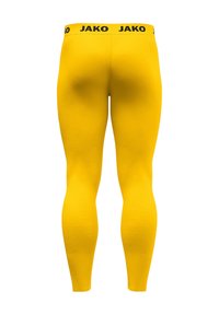 Leggings sportivi gialli a vestibilità aderente, con un cinturino nero "JAKO" e una texture liscia, progettati per un comfort ottimale e flessibilità.