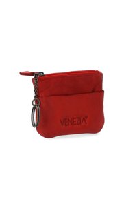 Red leather coin pouch with zipper closure and keyring attachment. Features a front pocket and embossed "VENEZIA" logo. Smooth texture.