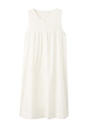 Robe blanche en coton sans manches avec encolure ronde, patte de boutonnage à quatre boutons sur le devant et coupe ample jusqu'aux genoux.