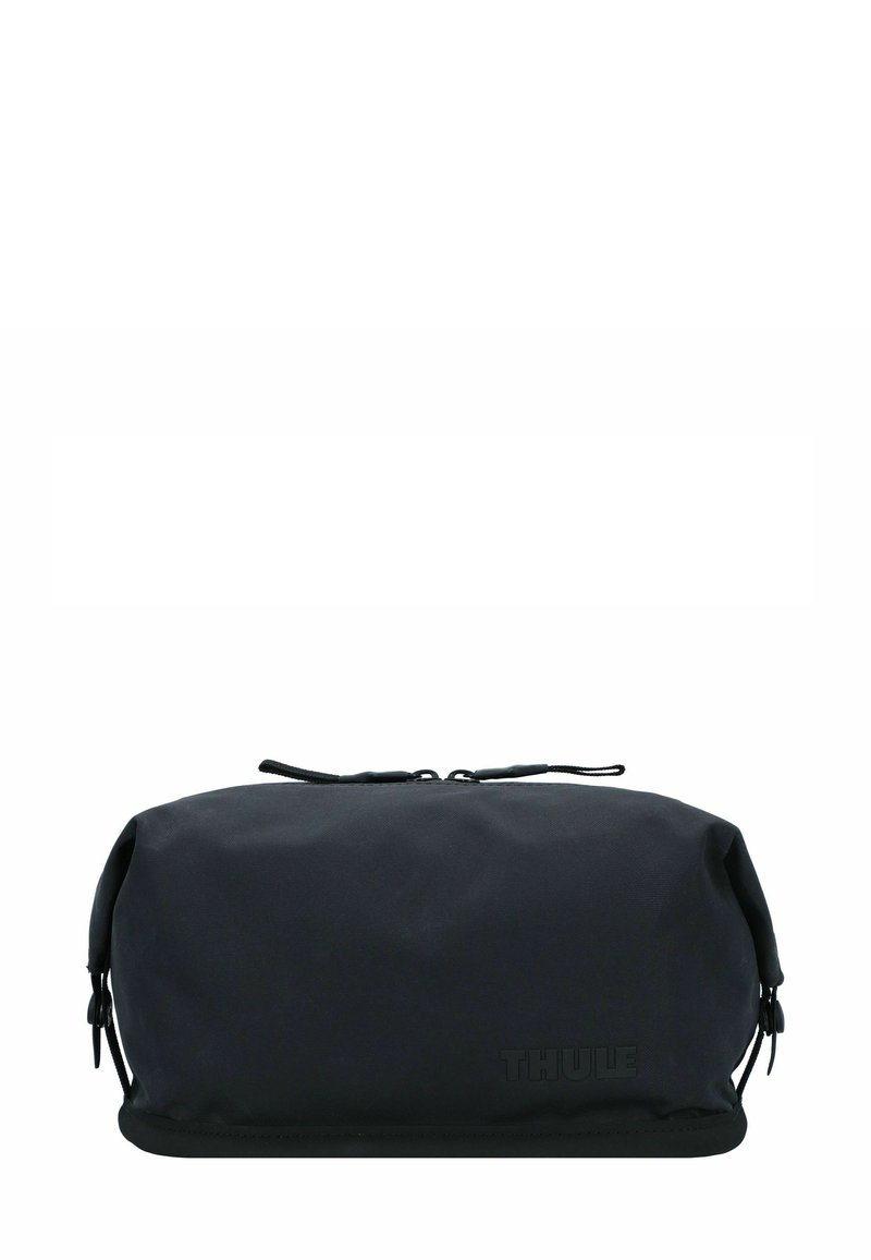 Funda de viaje suave rectangular negra con tiradores de doble cremallera y sutil logo de "Thule" en el lado frontal.
