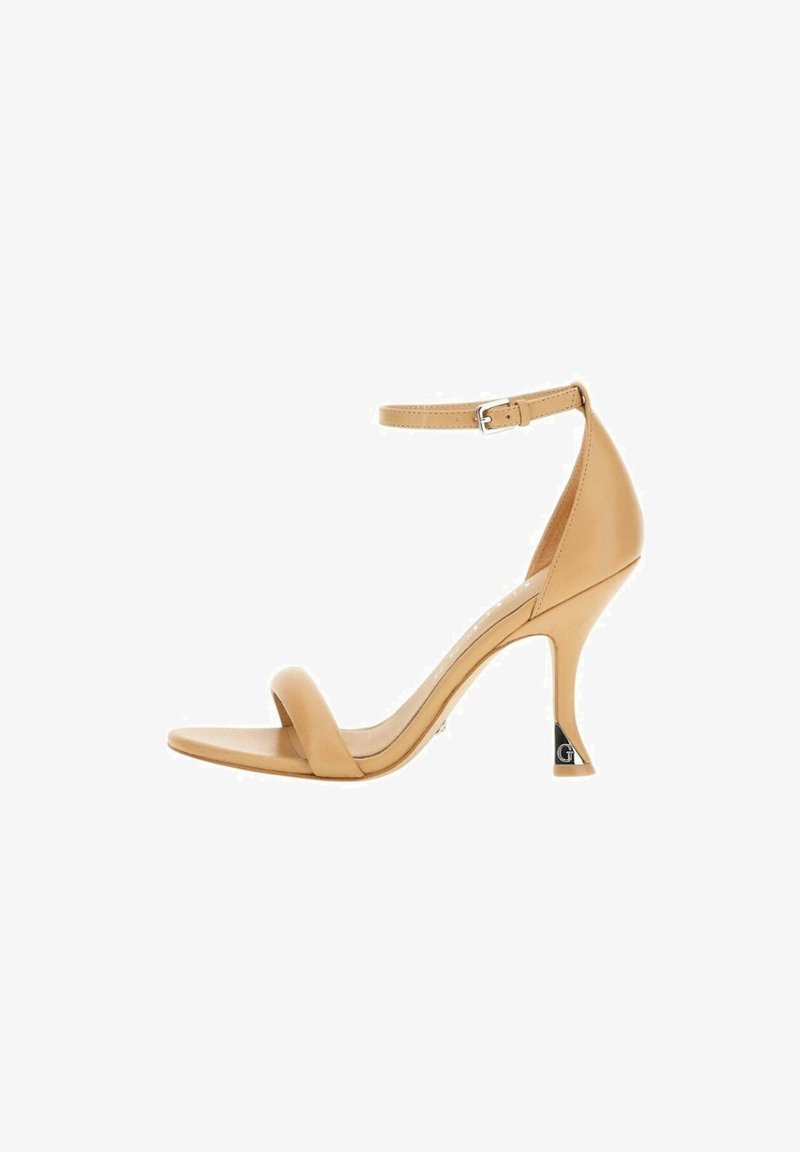 Sandaletti in pelle nudi con tacco alto, una sola fascia frontale, cinturino alla caviglia e tacco stiletto, con un accento lucido sul tacco.