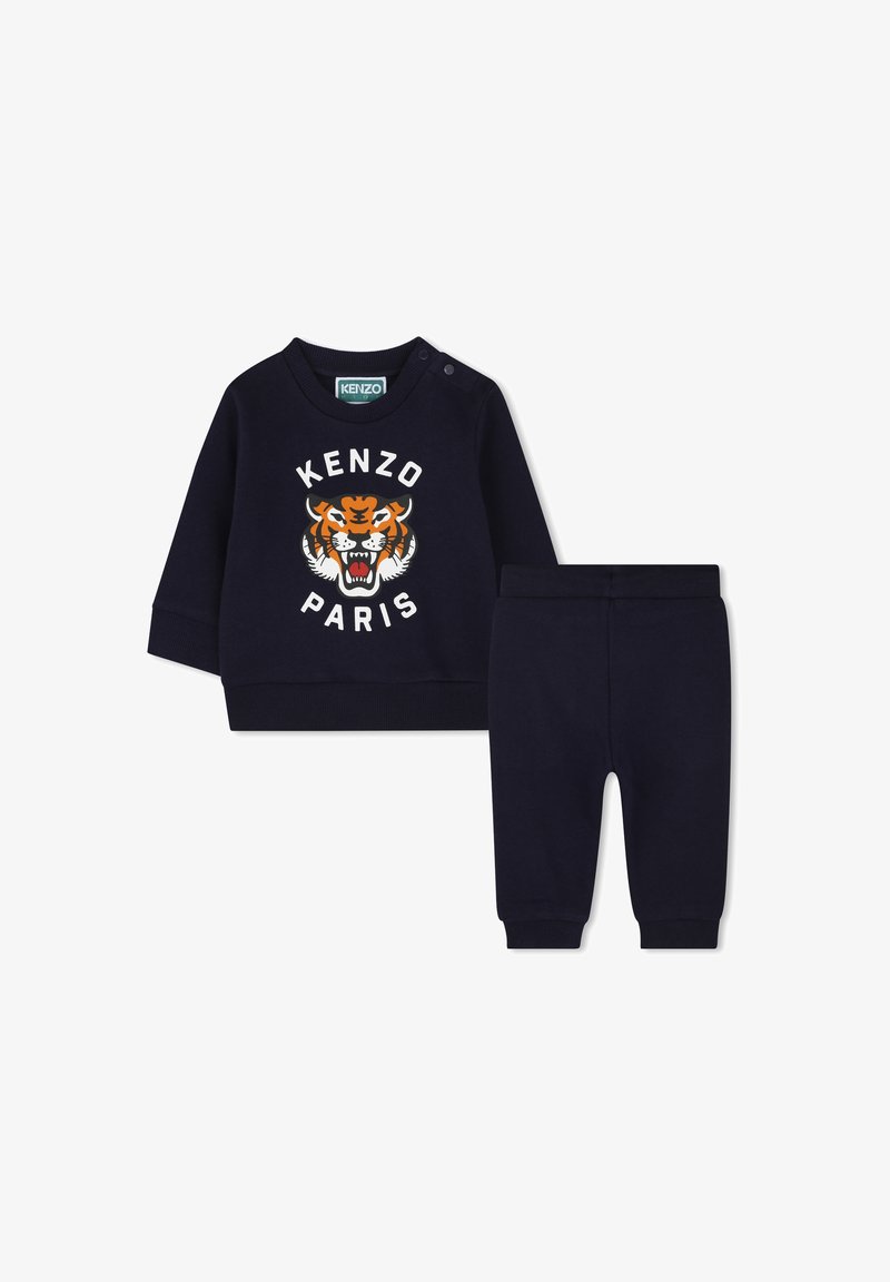 Marineblauwe twee-delige outfit met een sweatshirt met een tijgerafbeelding en de tekst "KENZO PARIS", gecombineerd met bijpassende jogger stijl broek.
