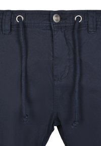 Navy blue lightweight shorts with a drawstring waist, metallic button fastener, and two side pockets, textured fabric with subtle sheen.