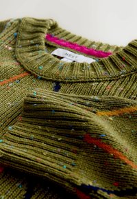 Olive green knitted sweater with a ribbed crew neckline. Features multicolored flecks and horizontal stripes in orange and blue. Tag visible.