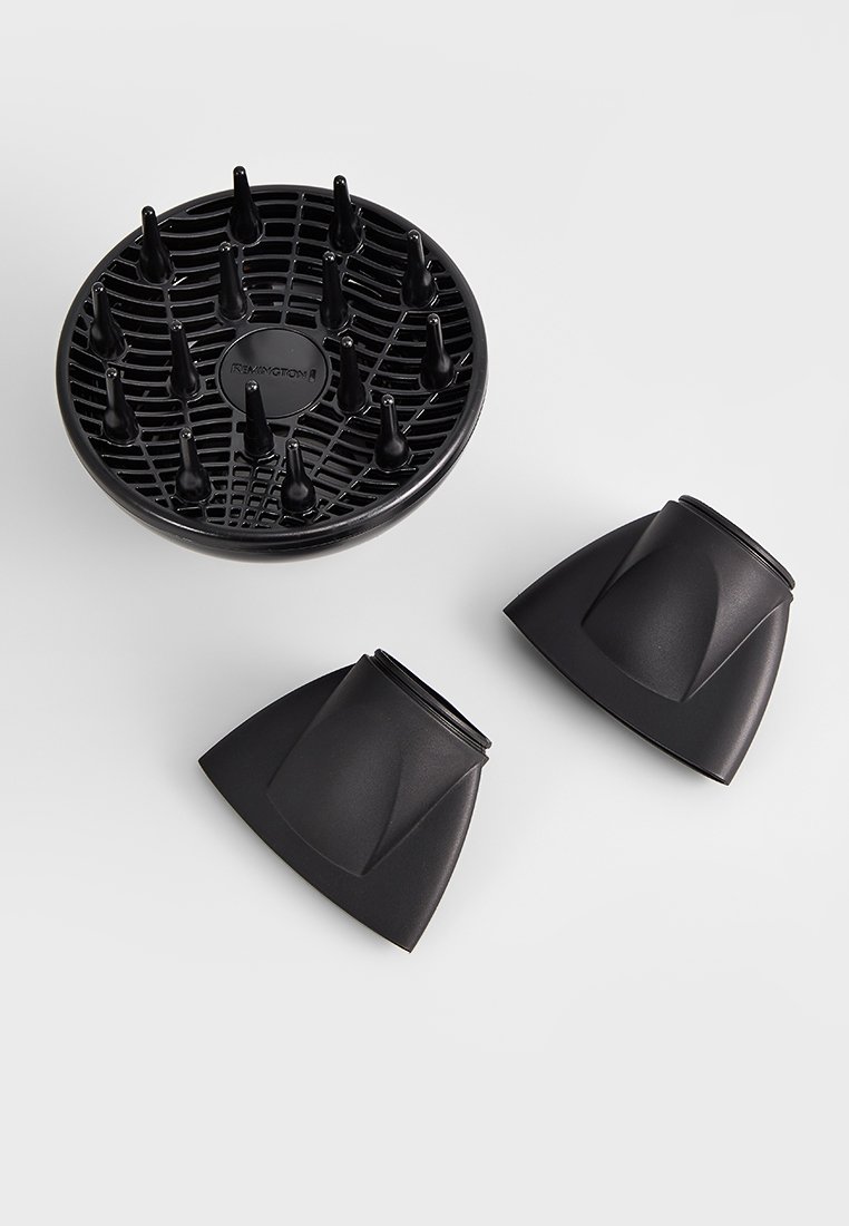 Sèche-cheveux noir avec diffuseur à base ronde comprenant plusieurs embouts coniques ; inclut deux embouts détachables avec bords incurvés.