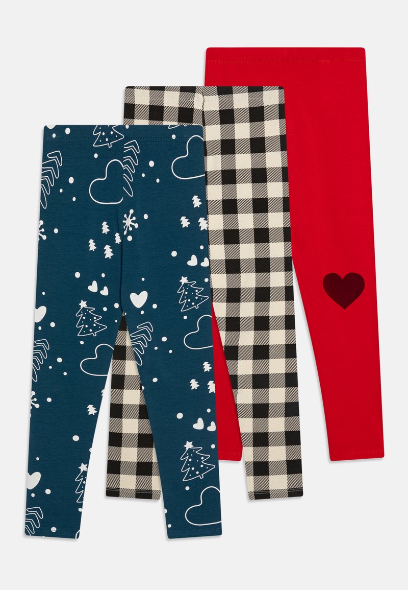 Three pairs of leggings: blue with white patterns of trees and hearts, black and white checkered, solid red with a heart accent on one leg.