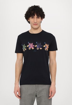 Black cotton t-shirt featuring a multicolored graphic print of playful shapes across the chest. Crew neck and short sleeves, fitted design.