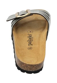 Sandale avec semelle en liège noir et tige grise, dotée d'une sangle réglable avec boucle. Doublure intérieure douce et semelle intérieure anatomique pour un confort optimal.