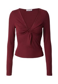 Bordeaux lange mouw top met een diepe V-hals en gedraaide voorzijde, met ribbelstructuur en een getailleerd silhouet.
