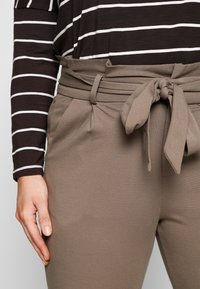 Vero Moda Curve Calças - bungee cord