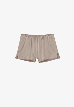Beiga satinsshorts med elastisk midja, med sidofickor för lättare rörelse. Slät textur och slimmad design.