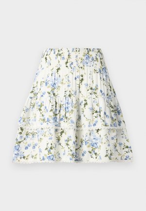 Florale rok in het wit met blauwe en groene bloemen, elastische tailleband, gelaagd ontwerp en kantafwerking aan de zoom. Lichtgewicht stof.