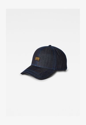 Donker denim baseballcap met blauwe stiksels en een G-Star Originals label. Voorzien van een ronde klep en een verstelbare achterkant.