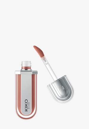 KIKO Milano liquid lipstick in a transparent container, featuring a metallic silver cap and a soft applicator tip with a pinkish-nude shade.