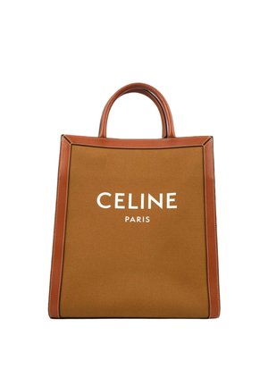 Ruskea kangas- ja nahkainen olkalaukku yläkahvoilla, etupuolella valkoinen "CELINE PARIS"-logo.