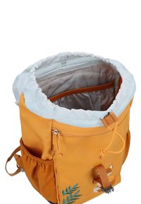 Orange fabric backpack with a cinched top and white lining, features side pocket, embroidered plant design, and adjustable straps.