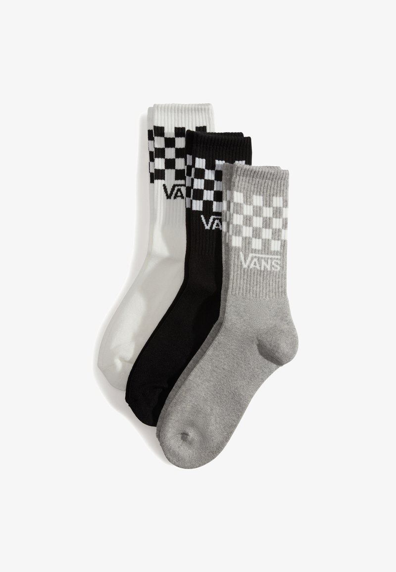 Tre par ankelstrømper: én hvid med et sort ternet mønster, én sort med et hvidt ternet mønster og én grå. Lavet af en blanding af bomuld.