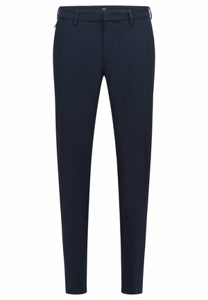 Pantalon marine à coupe slim, en tissu lisse, avec fermeture éclair et passants de ceinture. Sans motifs ni accents visibles.