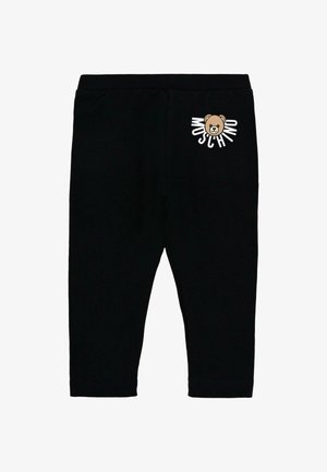 Czarne legginsy z elastycznym pasem, z nadrukiem graficznym misia oraz białym tekstem "Moschino" na lewym biodrze. Miękki, elastyczny materiał.