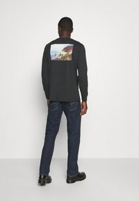 Levi's® 501® '93 STRAIGHT - Calças de ganga de perna direita - heather rinse