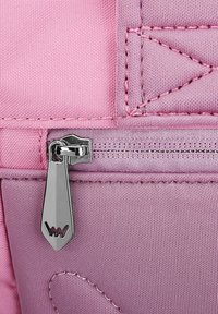 Pink nylon fabric with textured surface, featuring a metal zipper pull and stitched accents along the seams.
