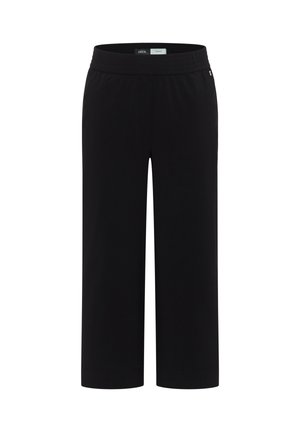 Mustat leveälahkeiset housut, joissa on joustava vyötärönauha, keskikorkea vyötärö ja yksinkertainen muotoilu, esillä valkoisella taustalla.