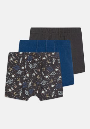 Three pairs of boys' boxer briefs: one with a space pattern on a dark background, one in navy blue, and one in dark gray. Soft cotton material.