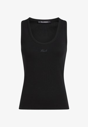 Črno rebrasto brezrokavnik z okroglim izrezom in majhnim vezenim logotipom "Karl" na prsih, etiketa Karl Lagerfeld znotraj izreza na vratu.