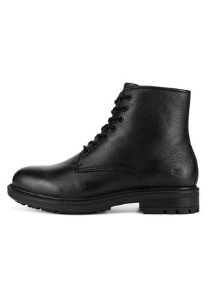Schwarze Leder-Stiefeletten mit strukturierter Oberfläche, rundem Zehenbereich, sechs Ösen und einer Gummisohle mit griffigem Profil.