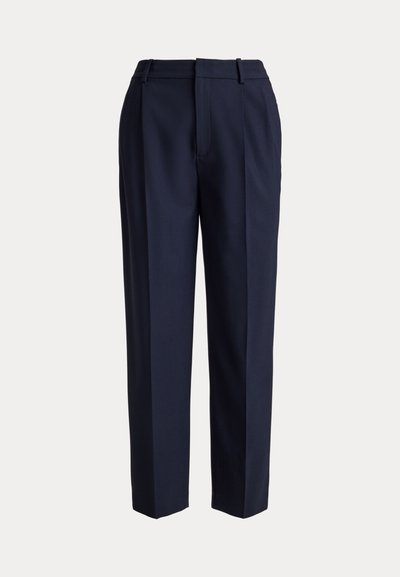 Navy blue tailored trousers with a straight-leg cut, featuring a smooth texture, front pleats, and belt loops. No visible pockets.