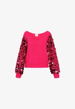 Fuksiaroosa V-kaelusega sviiter, millel on karvane keha ja pikad varrukad, mis on kaetud punaste sädelustega, luues tekstuurilise kontrasti.