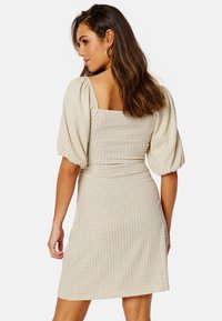 Bubbleroom SWEAT HEART WRAP DRESS - Etui-jurk - beige
