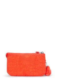 Small rectangular bright orange zippered pouch with a fluffy orange pom-pom keychain attached to the zipper pull.