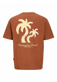 Rudas medvilninis marškinėliai su trumpomis rankovėmis. Yra didelis baltas palmės medis grafikas ir "Huntington Beach" tekstas ant nugaros.
