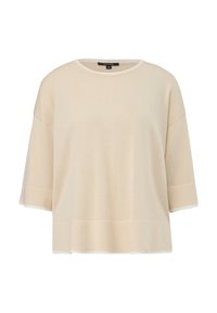 Beżowa bluzka z krótkim rękawem o okrągłym dekolcie, wykonana z teksturowanego dzianinowego materiału, z kontrastowym białym wykończeniem na rękawach i dołach.