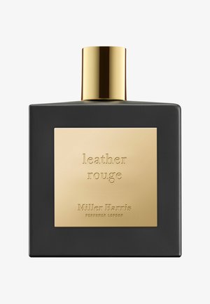 Schwarze rechteckige Parfümflasche mit einem goldenen Deckel. Verfügt über ein rechteckiges goldenes Etikett, das mit "Leather Rouge" und "Miller Harris" geprägt ist.