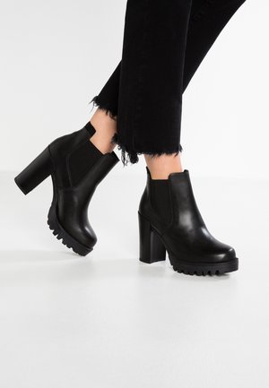 Enkellaarsjes met hoge hak - black