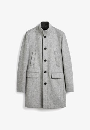 Pelēks zigzagā iešūts mētelis ar augstu apkakli, pogu aizdari, divām priekšējām kabatām un teksturētu audumu. Vienkāršs un taisnu griezumu dizains.