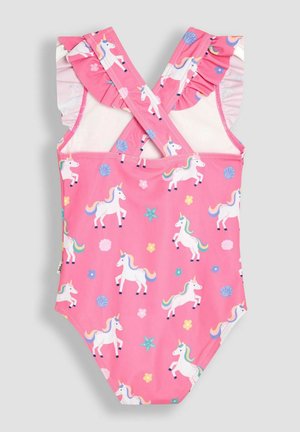 Pink one-piece swimsuit with cross-back straps, ruffled shoulders, and unicorn prints among flowers and shells. Made of smooth fabric.