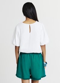 Calliope Pantaloni sportivi - verde petrolio