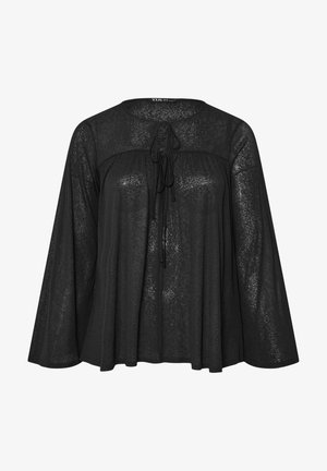 Blusa nera trasparente a maniche lunghe, ampia e morbida, con scollo rotondo e lacci frontali, caratterizzata da un dettaglio a yoke sul petto.