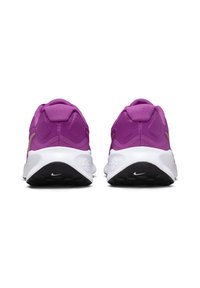 Purple athletic shoes with a textured upper, padded collar, white midsole, and black outsole. Features a logo detail on the heel.