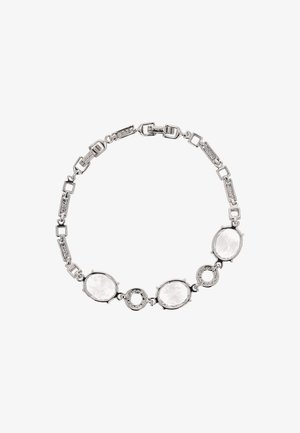 Ezüst karkötő ovális és kerek átlátszó drágakövekkel, textúrázott láncszemekkel és kapoccsal.