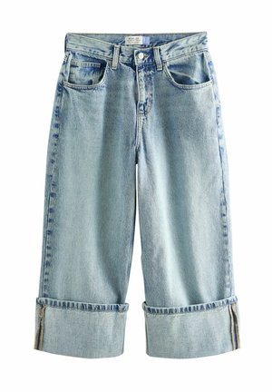 Ljusblå vida jeans i denim. Har uppspänt fåll, två framfickor och en lätt blekning för textur.