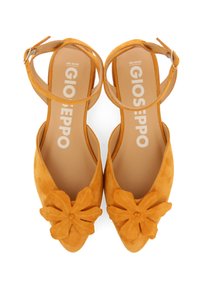 Sandalias de tacón alto de ante amarillo con adornos en forma de flor en la puntera y correas ajustables en el tobillo. Forro interior suave.