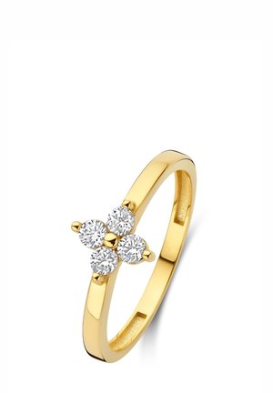 Gouden ring met vier ronde, heldere stenen in een bloemmotief. Gladde band, gepolijste afwerking en een strak ontwerp.