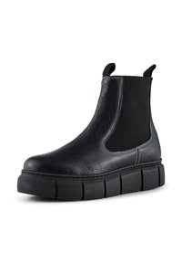 Bota Chelsea de cuero negro con paneles laterales elásticos, parte superior texturizada y una suela de plataforma gruesa con diseño segmentado.