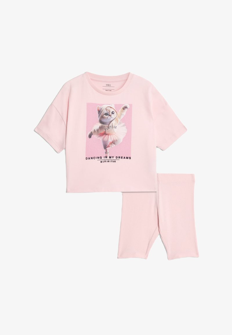 Różowa bawełniana bluzka z krótkim rękawem z grafiką kota w tutu, z napisem "Tańcząc w Moich Snach", w komplecie z pasującymi różowymi legginsami.